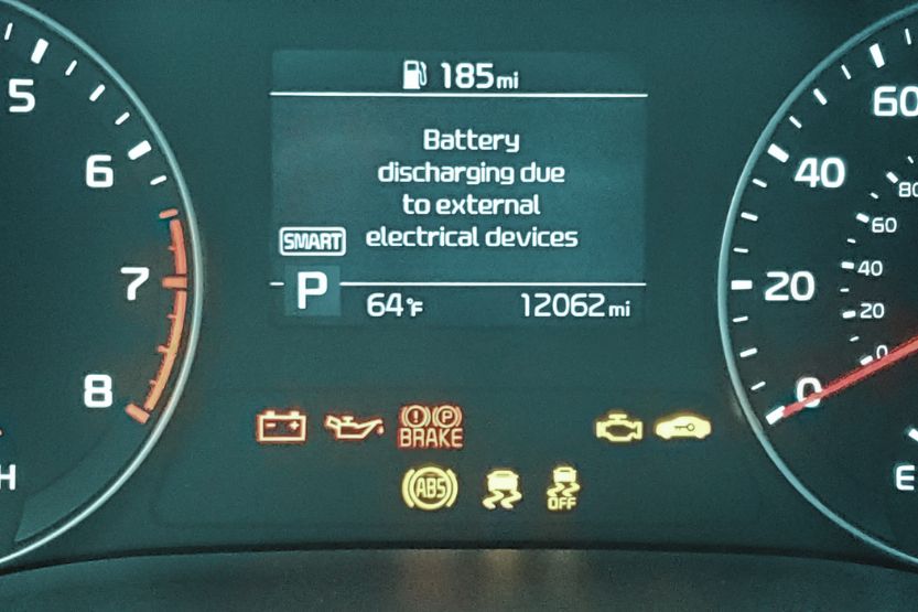 kia battery discharge warning while driving