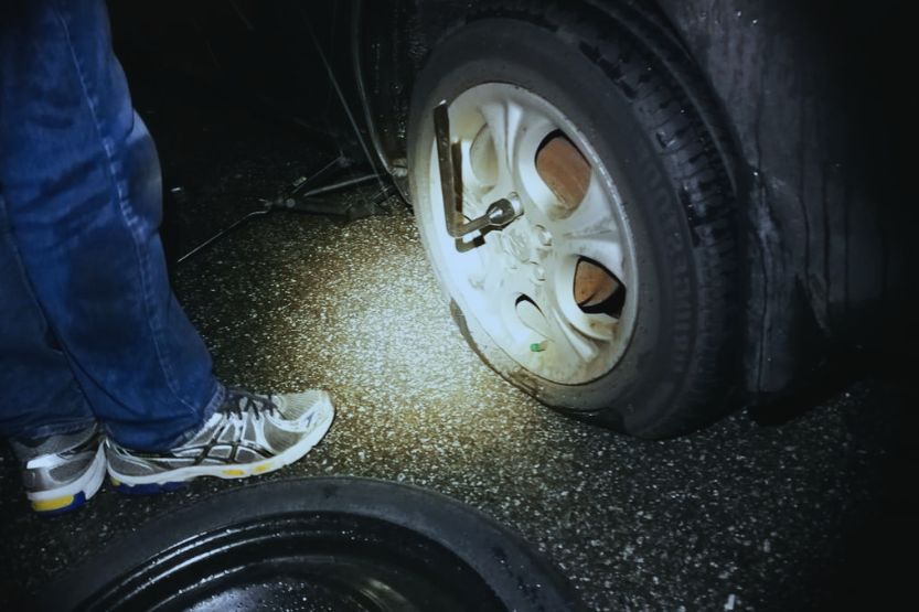 flat tire at night what to do
