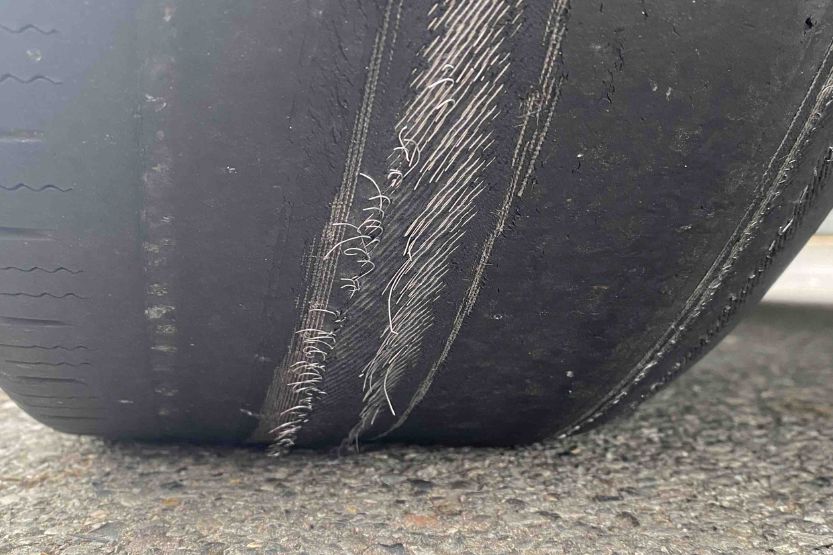 little wire showing on tire